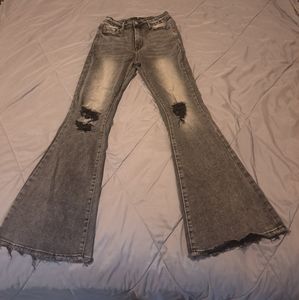 Risen high waisted flare leg raw hem jeans size 7.